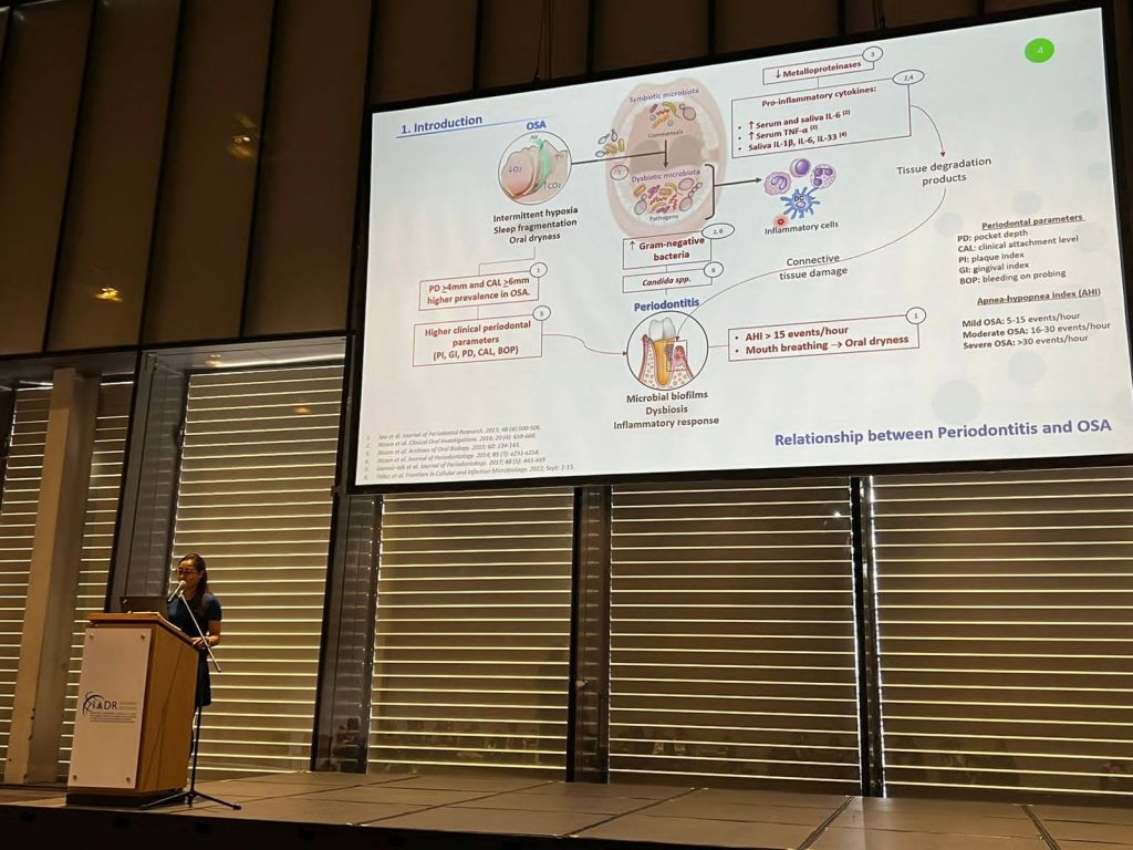 Mayra Téllez presentando su trabajo en la Sesión General de la Asociación Internacional para la Investigación Dental (IADR) en junio de 2023. Foto: archivo particular de la investigadora.